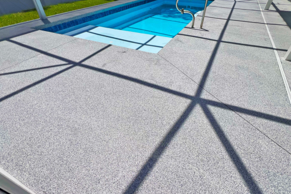 Pool deck with Polyaspartic Coating in Tidal Wave